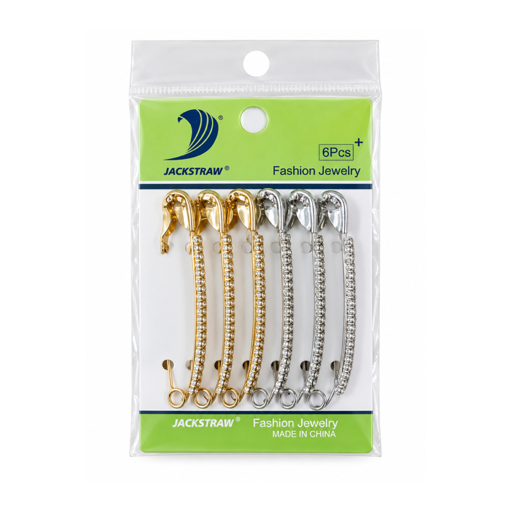 EPINGLE A NOURRICE STRASS DORE ET ARGENT